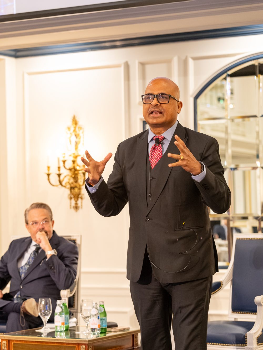 Ravi Teja Bommireddipalli delivering the opening keynote at the Fisher Phillips AI Evolution conference, Willard InterContinental, Washington, D.C.